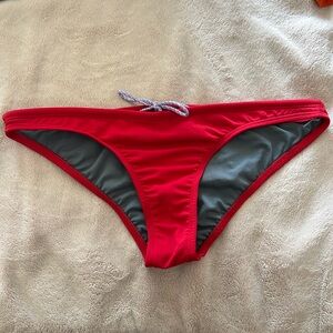 Jolyn “Europe2” bikini bottom. Red, size large.